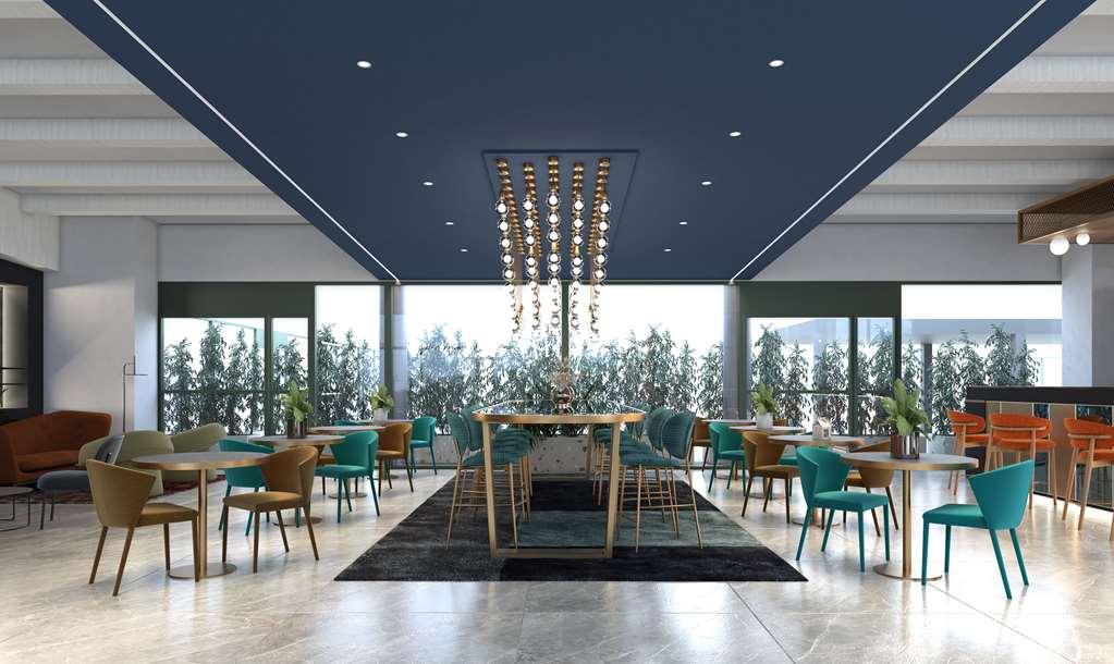 Готель Doubletree By Hilton Milan Malpensa Solbiate Olona Ресторан фото