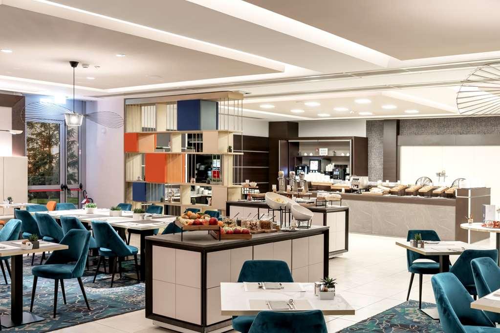 Готель Doubletree By Hilton Milan Malpensa Solbiate Olona Ресторан фото