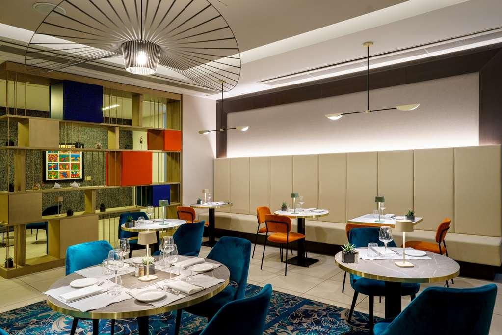 Готель Doubletree By Hilton Milan Malpensa Solbiate Olona Ресторан фото