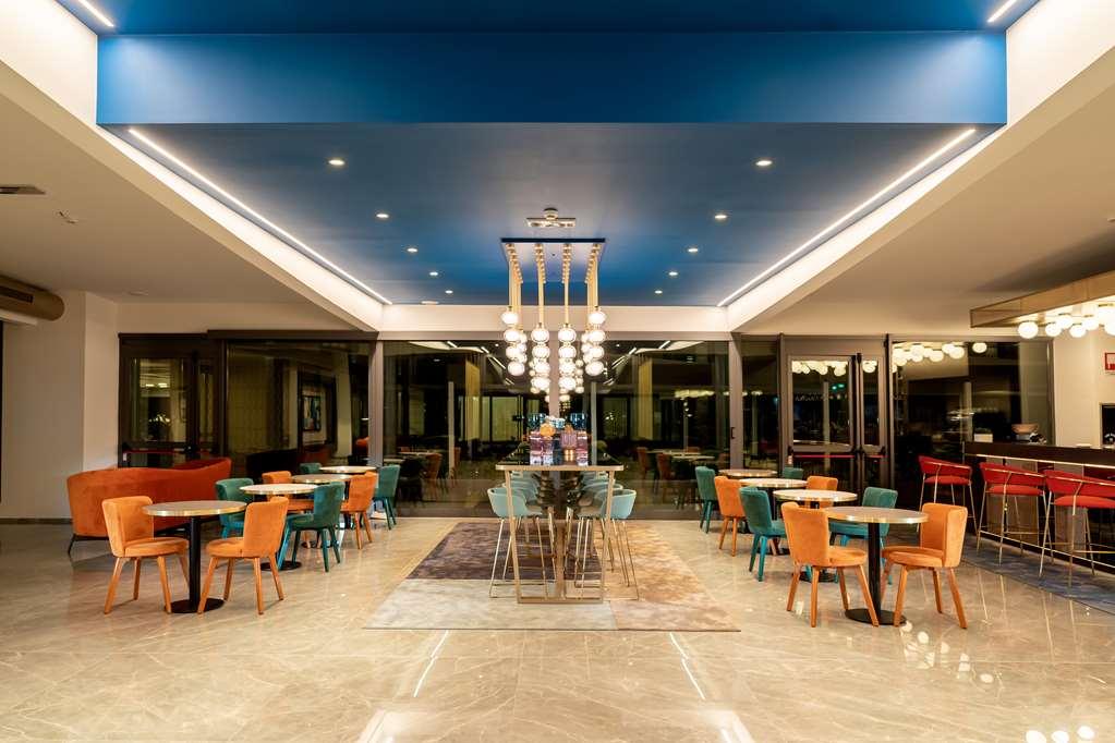 Готель Doubletree By Hilton Milan Malpensa Solbiate Olona Ресторан фото